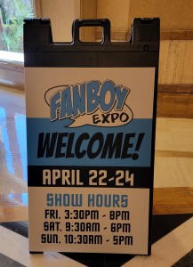 Image of a sign for Fanboy Expo with dates and times.